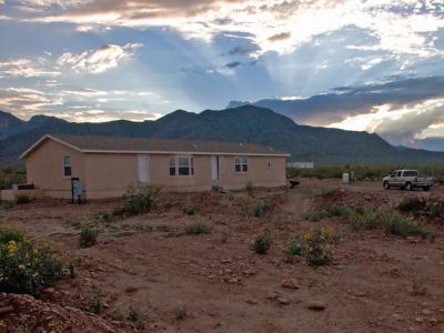 The sun sets on Tom's place, now complete with running water