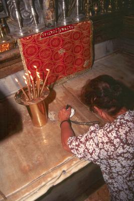 Praying in the Tomb of Jesus