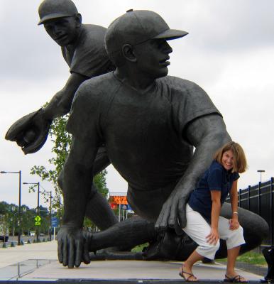 Lisa and the Statues in front of the Phillies' Stadium