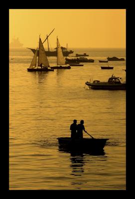 Boat mumbai harbor sunrise.jpg
