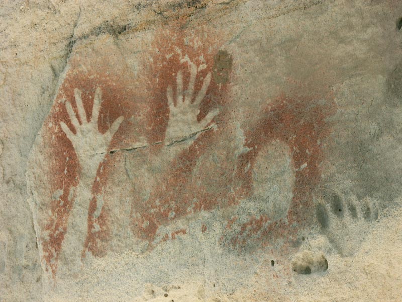 Stencils, ochre on sandstone
