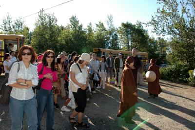 greeting at maple village by monks