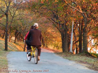 A couple enjoying the evening biking  at Bomun..