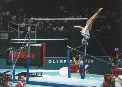 Romainian Marinescu dismount from uneven parallel bars