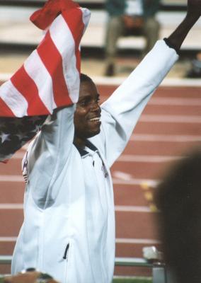 Carl Lewis wins gold in the long jump