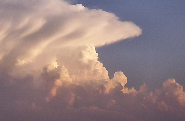 Swelling Storm Clouds