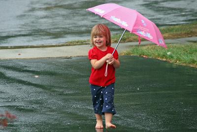 Barefoot and Happy in the Rain