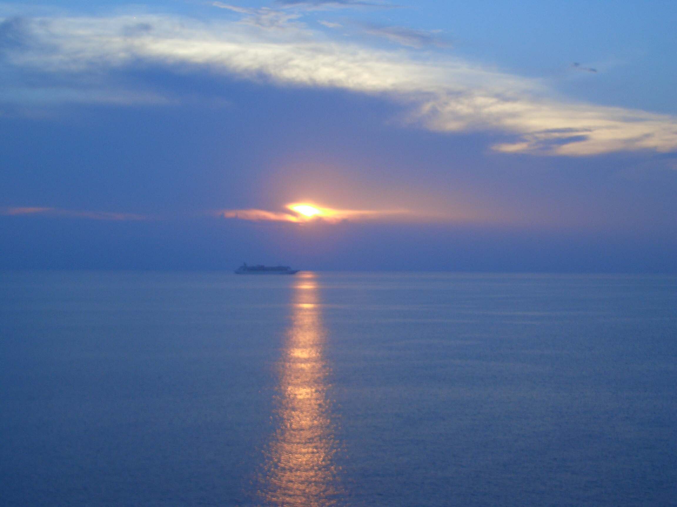 Passing another cruise ship at sunset.jpg