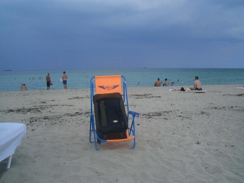 Suitcase by the sea