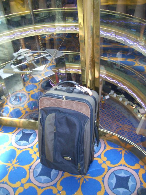 Suitcase heads down to the ships lobby
