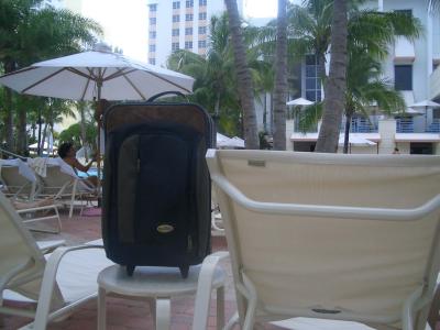 Suitcase by the pool