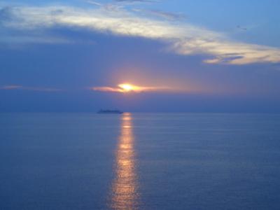 Passing another cruise ship at sunset.jpg