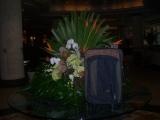 Suitcase enjoying the floral arrangement