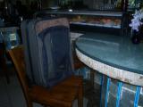 Suitcase orders sushi