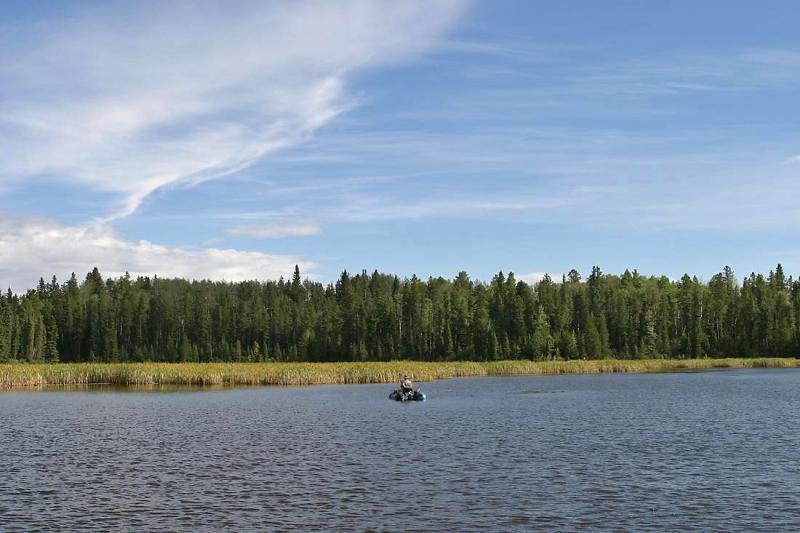 Pontoon Boat Fly Fisherman