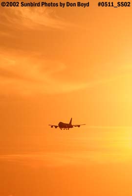 B747 approach at sunset aviation airline stock photo #0511_SS02