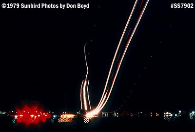 1979 - one takeoff and one landing time exposure aviation stock photo #SS7902