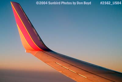 Wing of Southwest Airlines B737-7H4 N436WN at sunset aviation airline stock photo #2562