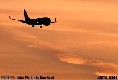 Southwest Airlines B737-7H4 on approach at sunset aviation airline stock photo #3075