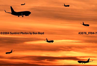 Fantasy photo of 7 B737-700's on approach at sunset stock photo #3076