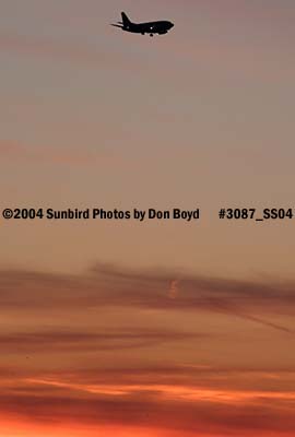 Continental Airlines B737-524 on approach at sunset aviation airline stock photo #3087