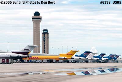Seven B-727 cargo aircraft in a row at MIA aviation cargo airline stock photo #6398