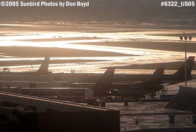 Tails of US Airways aircraft after a rainstorm in the late afternoon aviation stock photo #6322