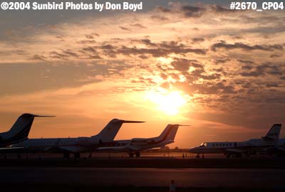 Corporate jets on the ramp at sunset aviation stock photo #2670