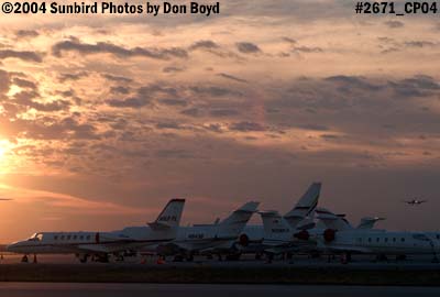 Corporate jets on the ramp at sunset aviation stock photo #2671