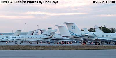 Corporate jets on the ramp at twilight aviation stock photo #2672