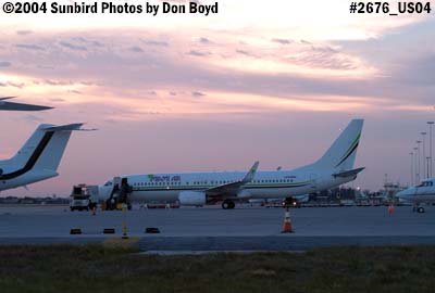 Miami Air International's B737-8Q8 N734MA on the ramp at sunset aviation stock photo #2676