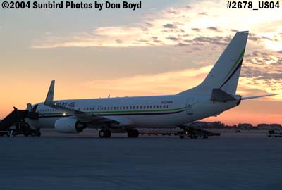 Miami Air International's B737-8Q8 N734MA on the ramp at sunset aviation stock photo #2678