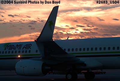 Miami Air International's B737-8Q8 N734MA on the ramp at sunset aviation stock photo #2683