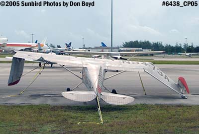 Sislik Maxim's Cessna 140A N9473A damaged by Hurricane Katrina the night before aviation stock photo #6438