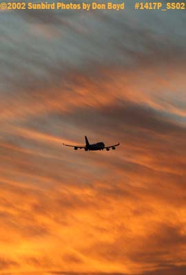 B747-400 takeoff into a gorgeous sunset sky aviation stock photo #1417P