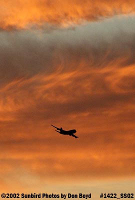 B747-400 takeoff into a gorgeous sunset sky aviation stock photo #1422P