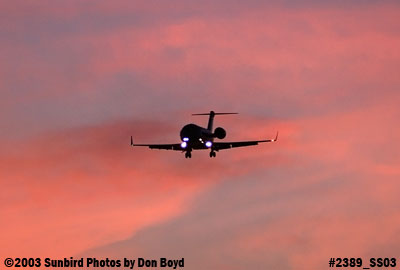 Bombardier CL-600-2B16 N78SD approach at sunset aviation stock photo #2389