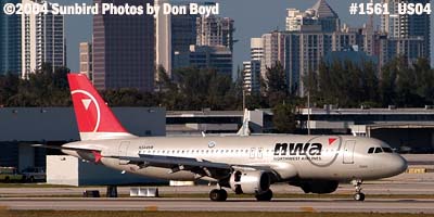 Northwest Airlines A320-212 N344NW with downtown Ft. Lauderdale in the background aviation airline stock photo #1561
