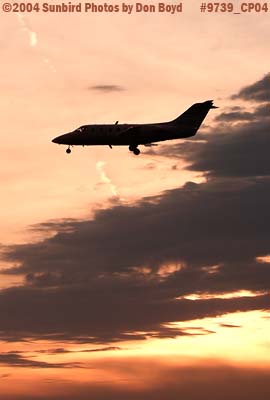 Flight Options LLC's (Richmond Heights, OH) Beech Beechjet 400A N431CW landing at sunset corporate aviation stock photo #9739