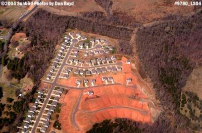 2004 - suburban sprawl and tree destruction into the south Charlotte countryside landscape aerial photo #9780