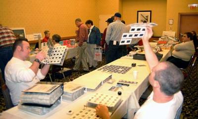 Michael Usevich and Joe Pries checking out slides at the 2005 Boston Airline Show, photo #7205