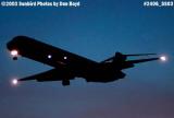 Spirit MD-80 approach at sunset aviation stock photo #2406