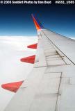2005 - left wing of Southwest B737-7H4 inflight aviation stock photo #6551