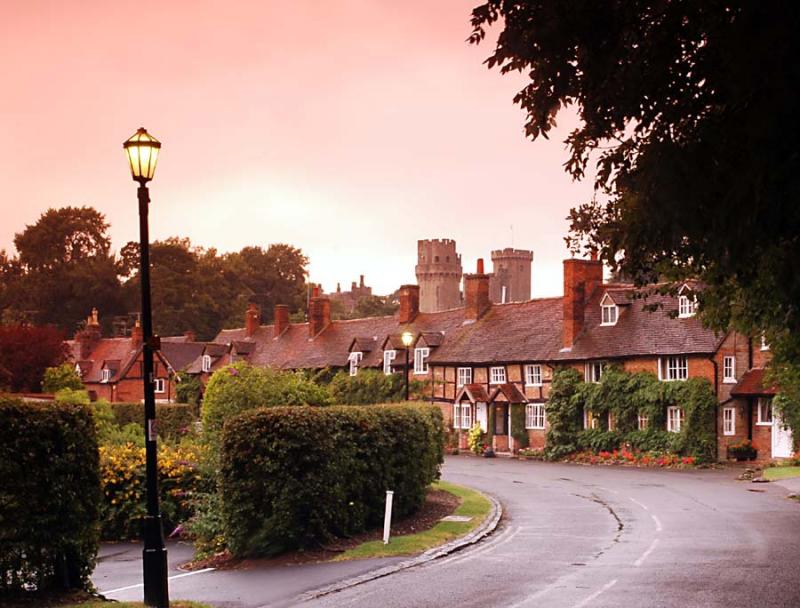 Bridge End Cottages, with Warwick Castle in the skyline beyond