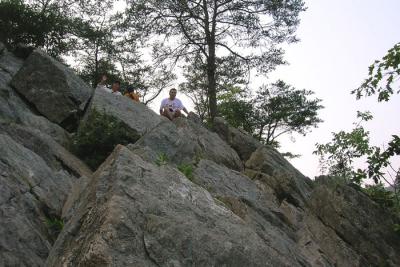 Mr. Chang on top of a huge rock