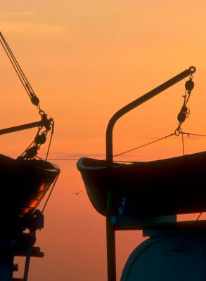 Fishing Boats at Sunset