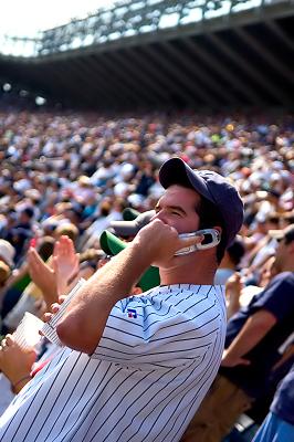 A fan, waiting for Strike Three in the last out of a 1-0 game against the Red Sox