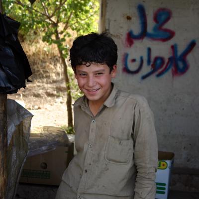 boy in roadside shop