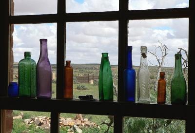 Bottles in a restrauant window.