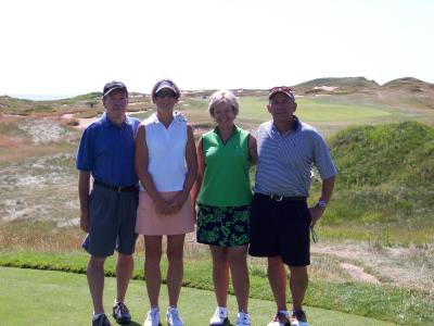 Kenny, Gayle, Carol and Rich on the first tee at the Straits Course